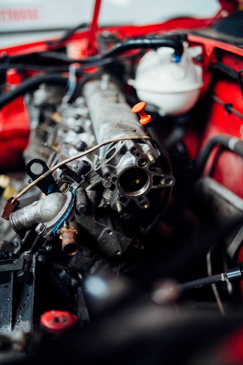 An engine bay with the hood open