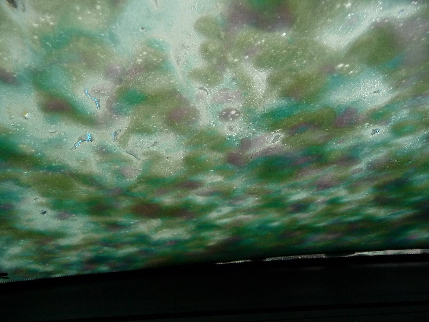 Photo of a soapy windshield