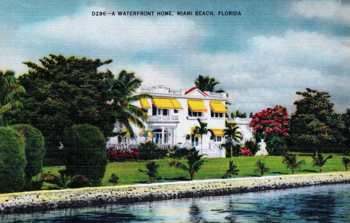 A vintage Florida postcard of a waterfront home with palm trees